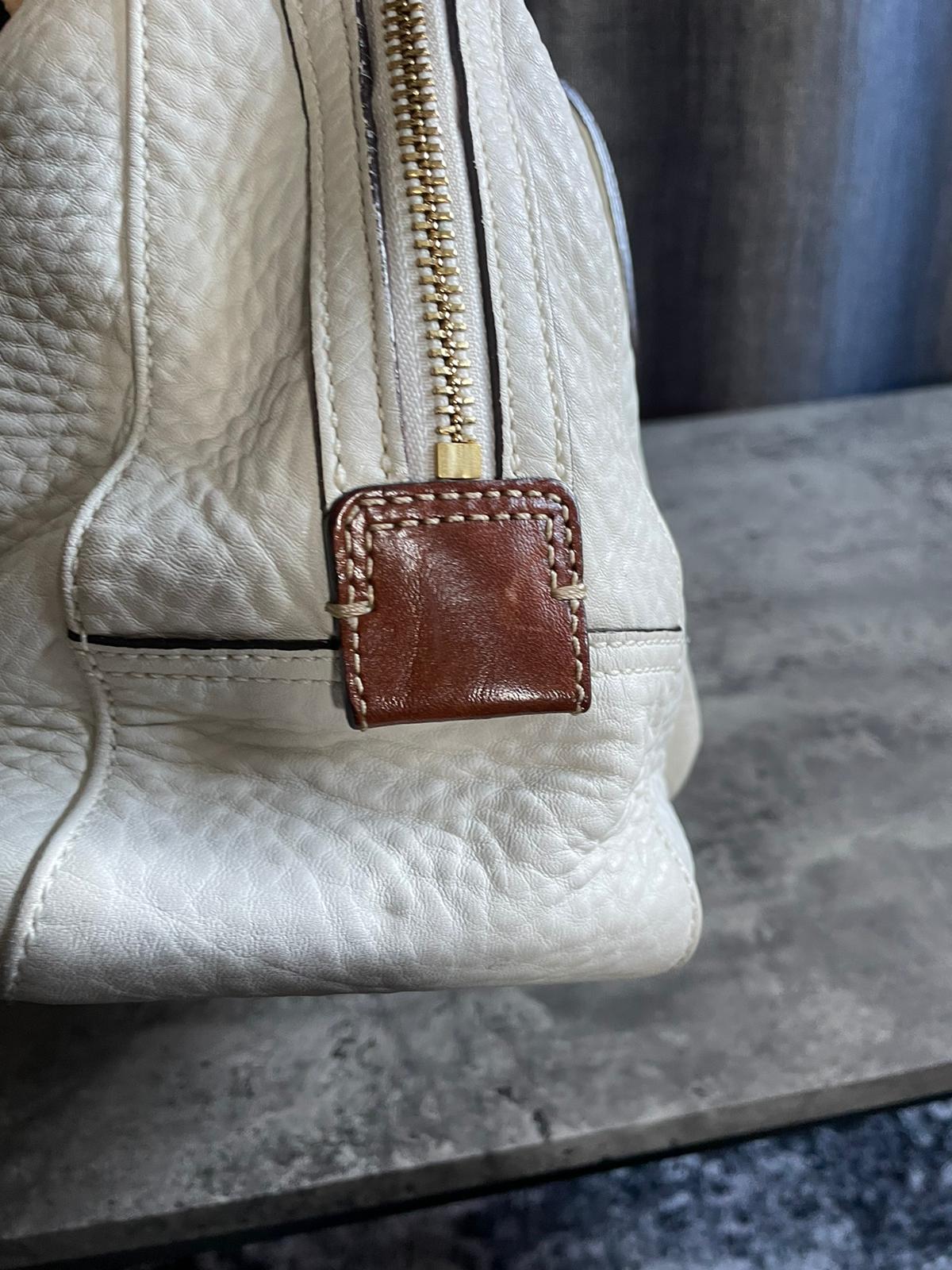 Vintage Coach Soho Handbag White/ Brown Leather Buckle Flap Authentic Y2k
Good condition