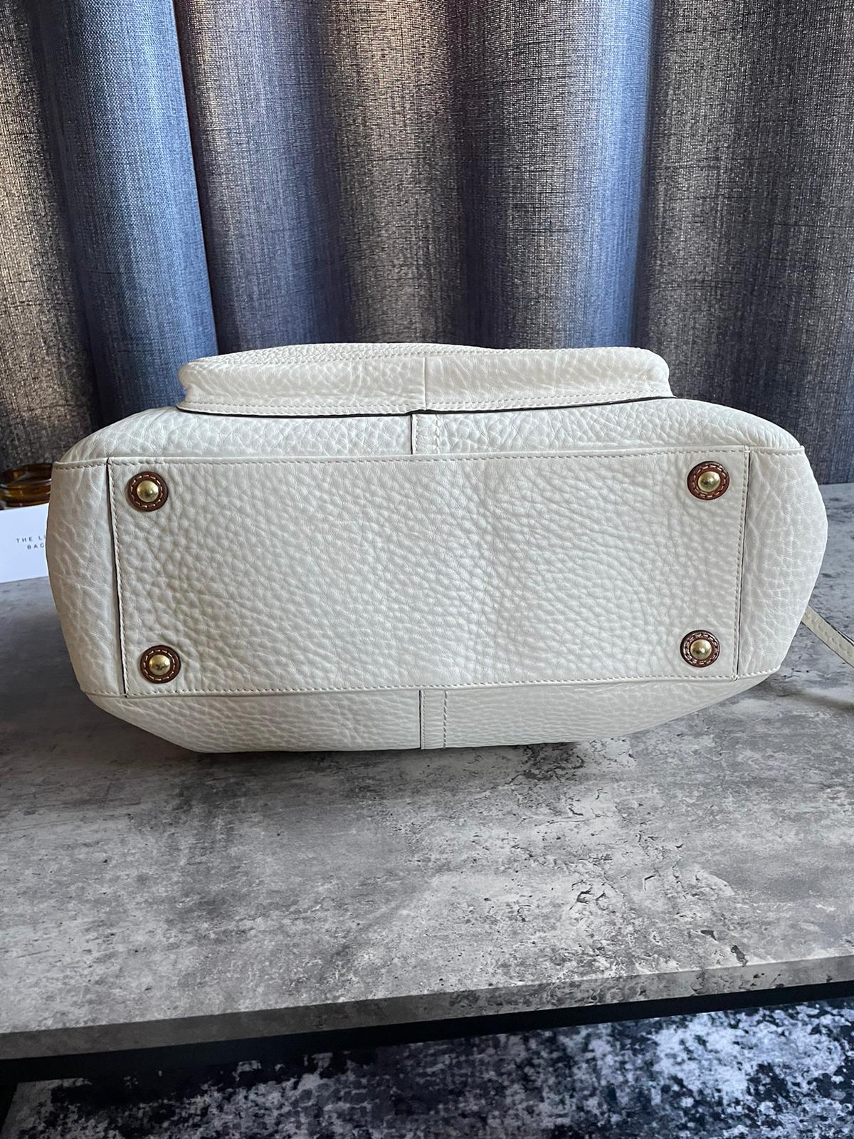 Vintage Coach Soho Handbag White/ Brown Leather Buckle Flap Authentic Y2k
Good condition